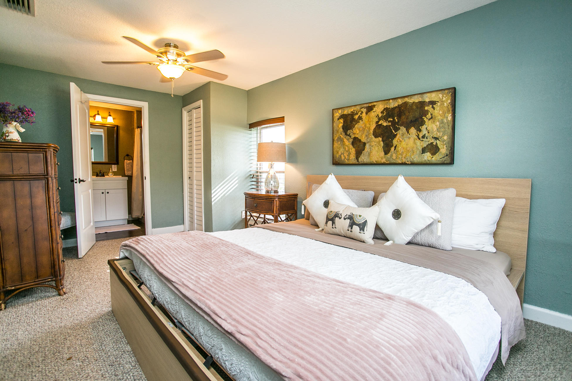 210 Palmetto Road St. Augustine, FL 32080 - Photo 7 of 16 a bedroom with bed and a chandelier