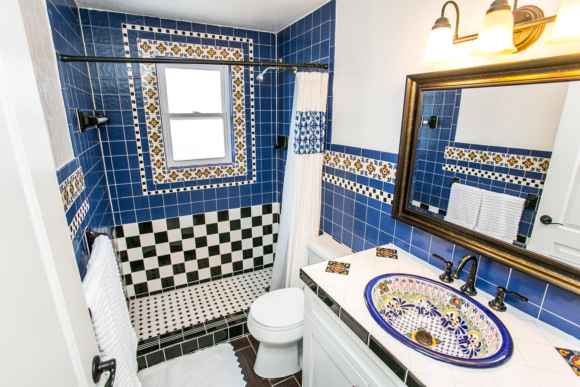 210 Palmetto Road St. Augustine, FL 32080 - Photo 10 of 16 a bathroom with a sink a toilet and shower