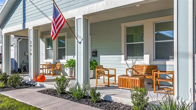a front view of a house with a porch