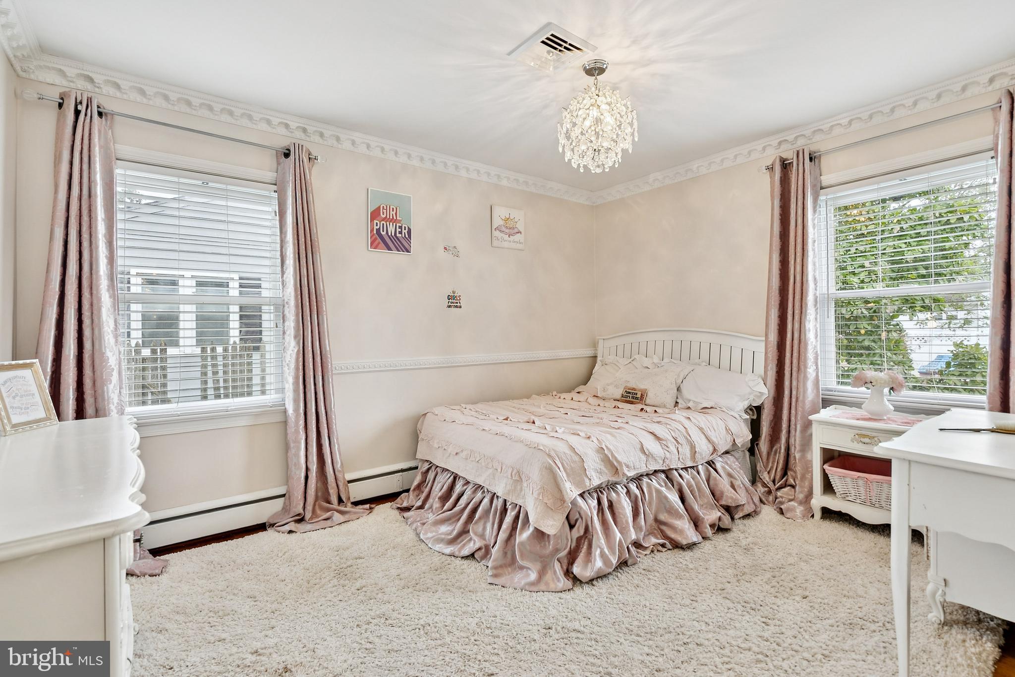 520 Rutgers Avenue Burlington, NJ 08016 - Photo 14 of 29 a bedroom with a bed and a table