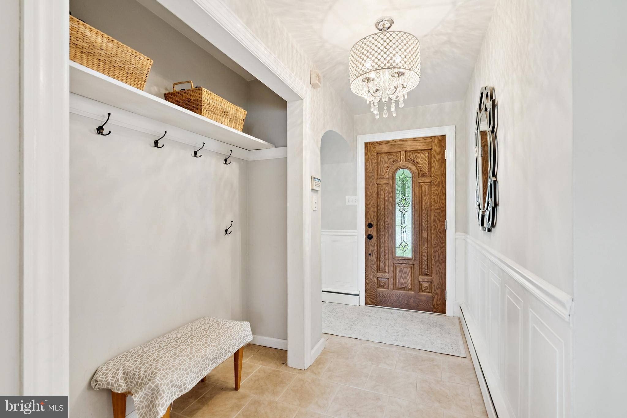 520 Rutgers Avenue Burlington, NJ 08016 - Photo 2 of 29 a view of a hallway with windows and chandelier