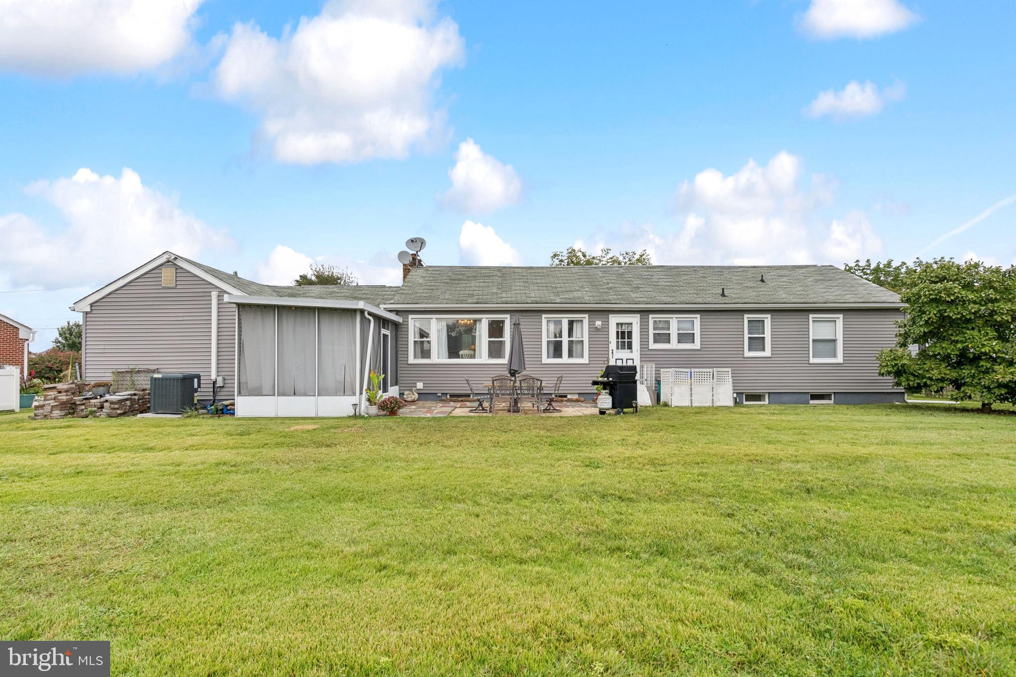520 Rutgers Avenue Burlington, NJ 08016 - Photo 25 of 29 a view of a house with a big yard and a large tree
