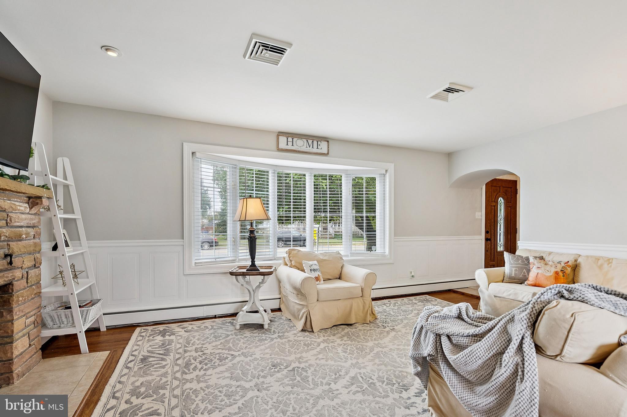 520 Rutgers Avenue Burlington, NJ 08016 - Photo 5 of 29 a living room with furniture and a flat screen tv