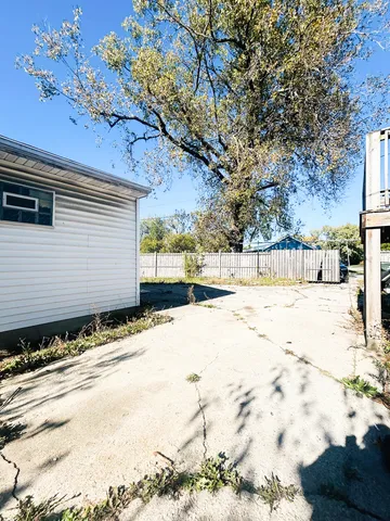 a view of snow on the side of the road