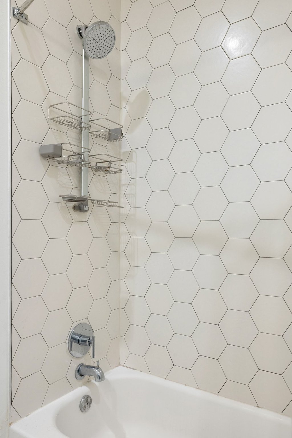 800 Embassy Drive, Unit 413 Austin, TX 78702 - Photo 12 of 27 Full bathroom featuring bathtub / shower combination