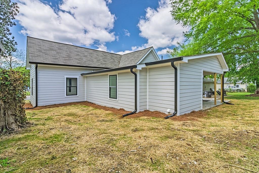 111 Ford Street Cartersville, GA 30120 - Photo 11 of 19 a view of a house with a yard