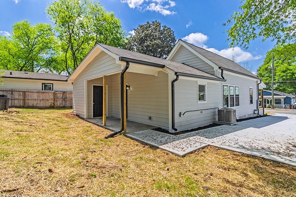 111 Ford Street Cartersville, GA 30120 - Photo 2 of 19 a view of a house with a yard