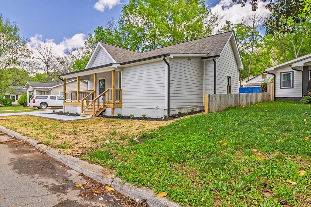 111 Ford Street Cartersville, GA 30120 - Photo 9 of 19 a view of a house with a yard