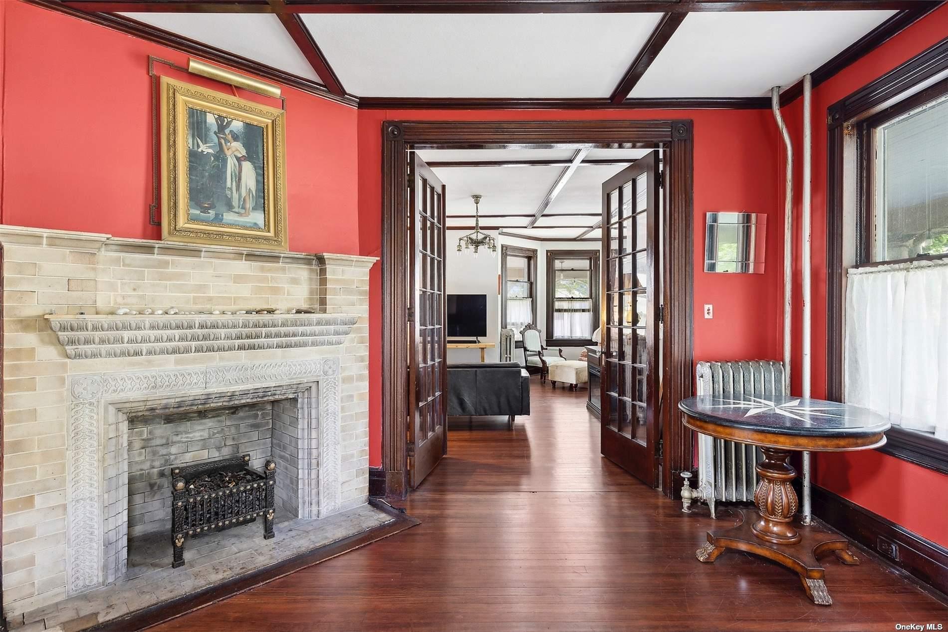 151 Bay Avenue Greenport, NY 11944 - Photo 8 of 21 a living room with furniture fireplace and flat screen tv