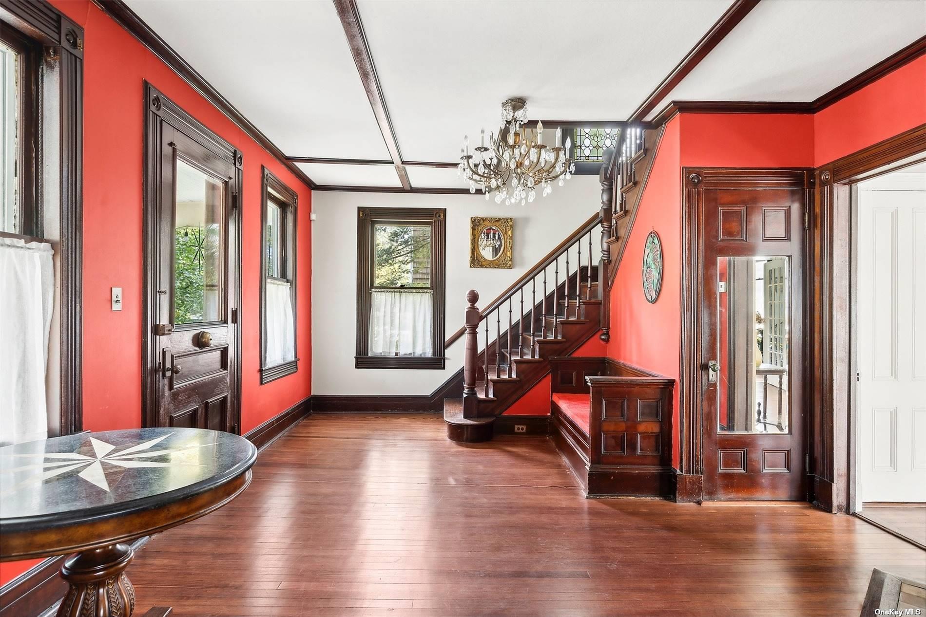 151 Bay Avenue Greenport, NY 11944 - Photo 9 of 21 a view of an entryway with hardwood and windows