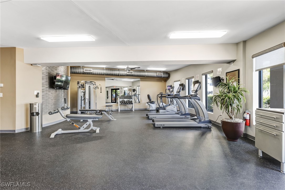1910 Virginia Avenue, Unit 403 Fort Myers, FL 33901 - Photo 45 of 45 a bedroom with furniture and view of living room
