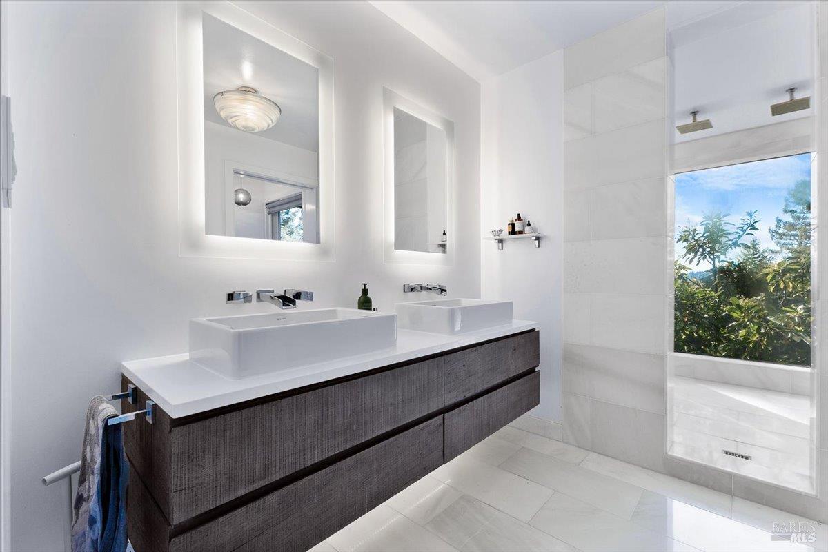 3100 Muniz Ranch Road Jenner, CA 95450 - Photo 37 of 62 a bathroom with a sink and a mirror