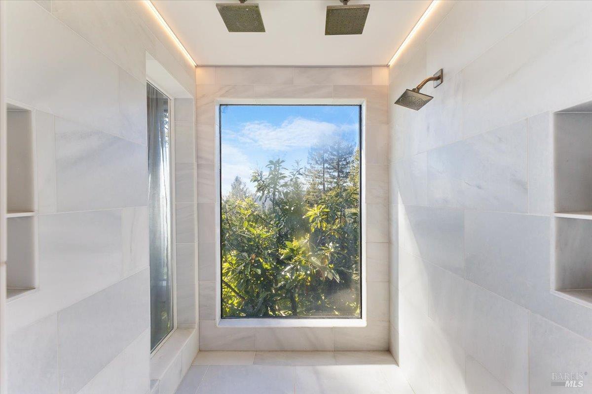 3100 Muniz Ranch Road Jenner, CA 95450 - Photo 53 of 83 Bathroom adjacent to the primary suite has an over-sized marble shower.