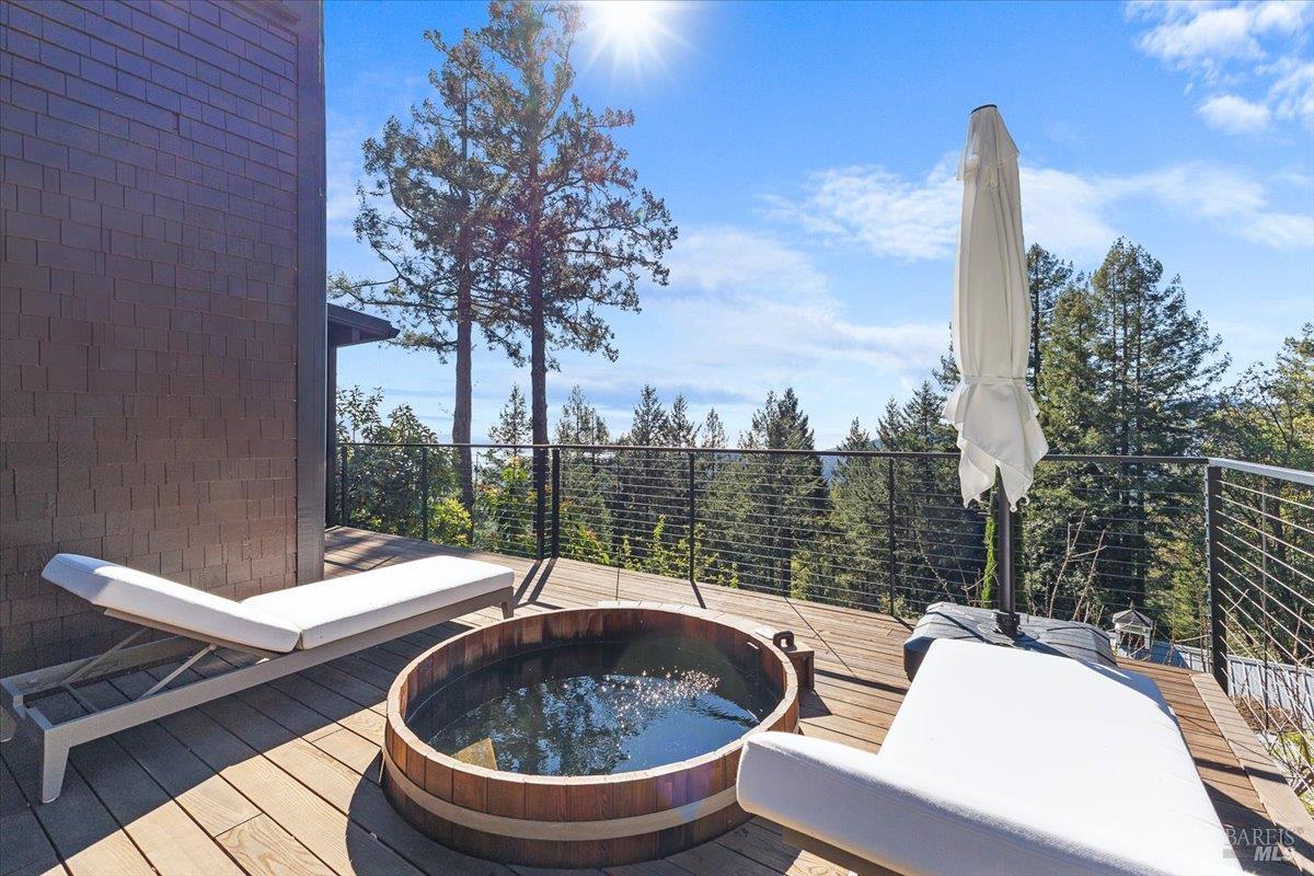 3100 Muniz Ranch Road Jenner, CA 95450 - Photo 54 of 83 Lower level deck with cedar tub and custom slim cable railings.
