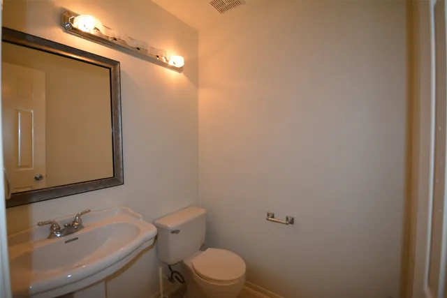 a bathroom with a sink and a toilet
