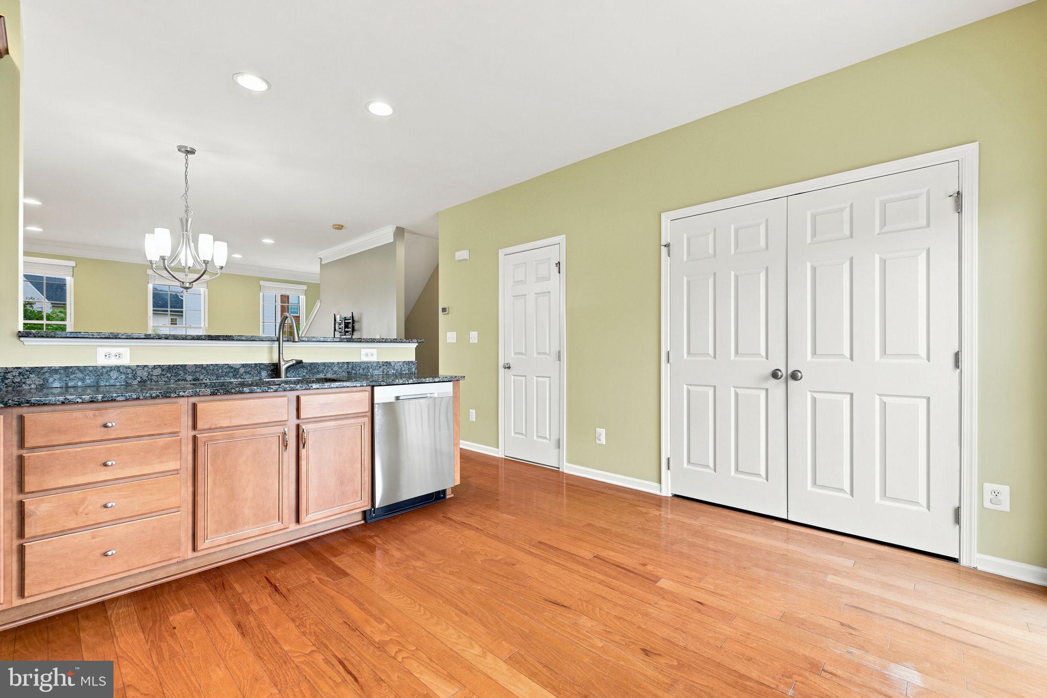 25156 Monteith Terrace Chantilly, VA 20152 - Photo 38 of 72 Modern kitchen with warm wood accents.