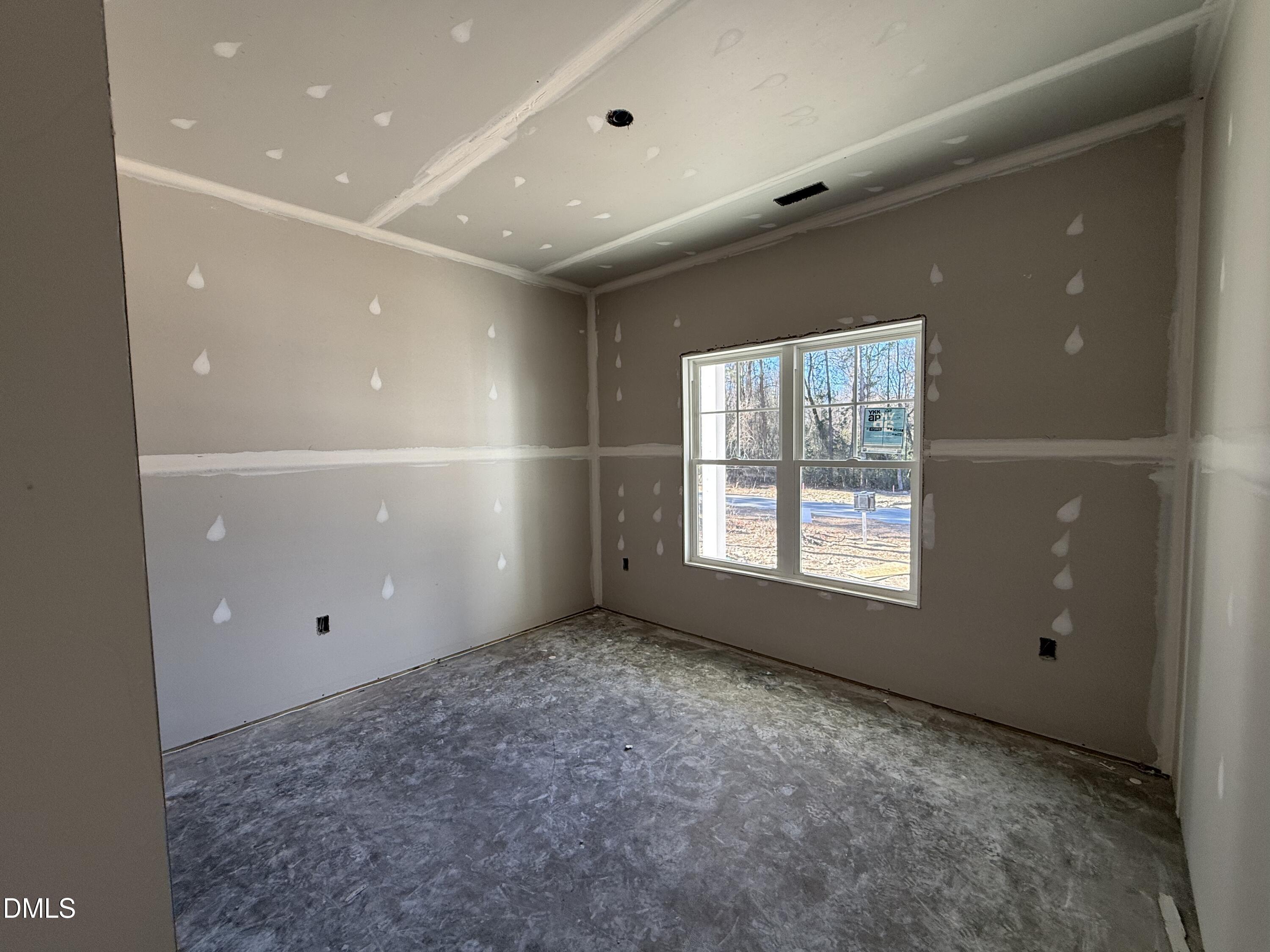 1725 Cardinal Drive Deep Run, NC 28525 - Photo 13 of 20 a view of an empty room with a window