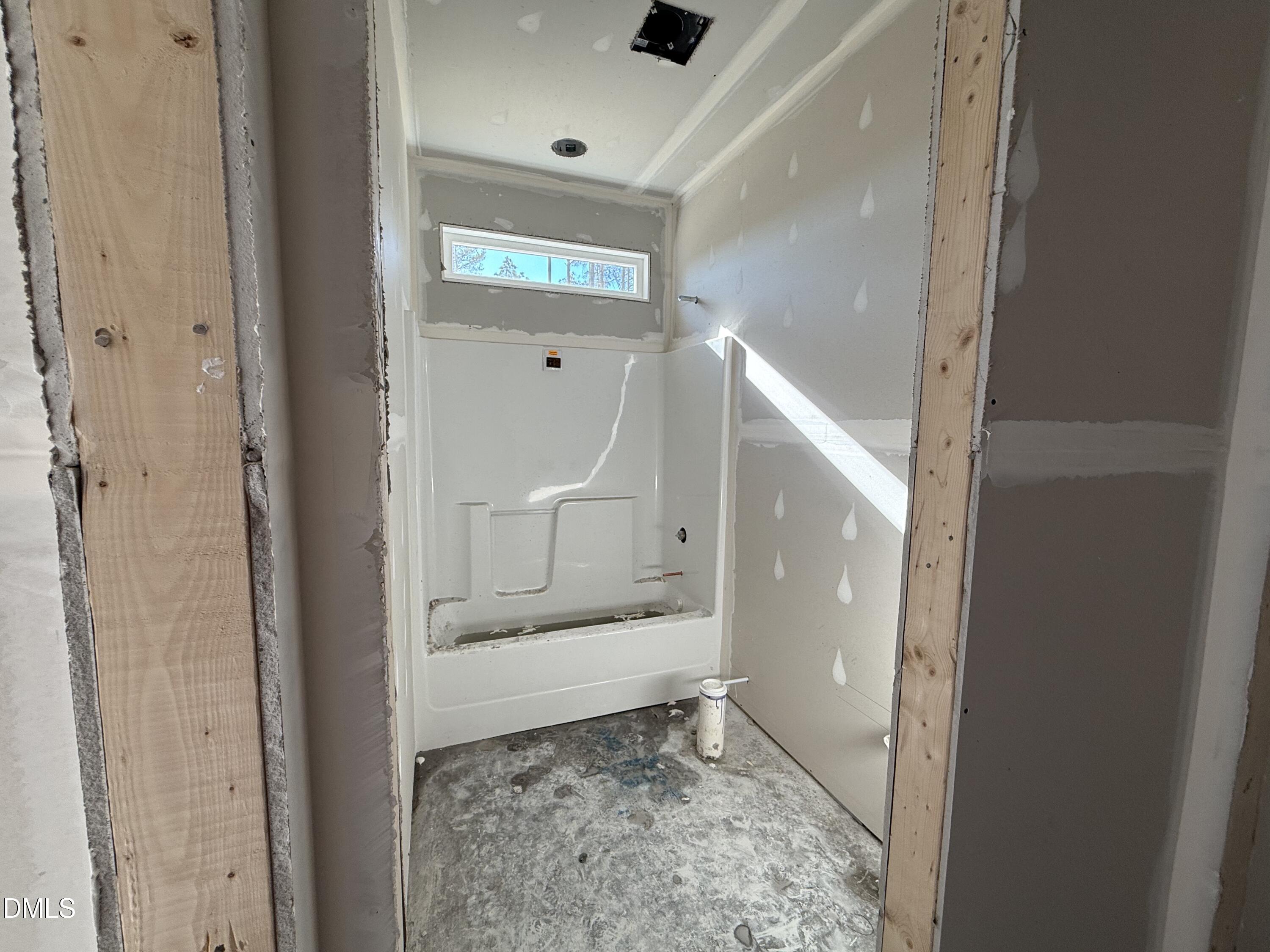 1725 Cardinal Drive Deep Run, NC 28525 - Photo 15 of 20 a bathroom with a glass shower door and a sink