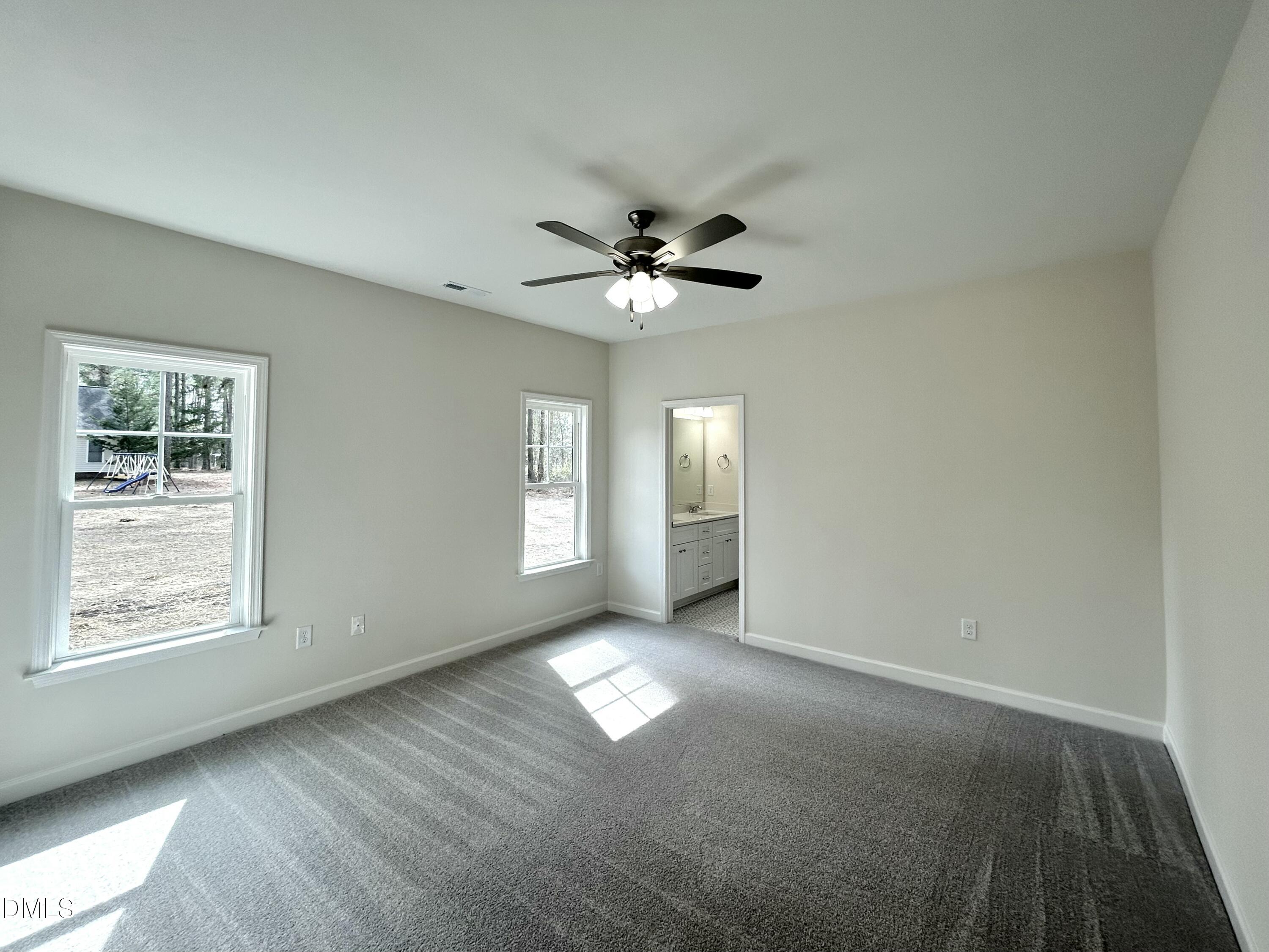 1725 Cardinal Drive Deep Run, NC 28525 - Photo 15 of 21 a view of an empty room with a window