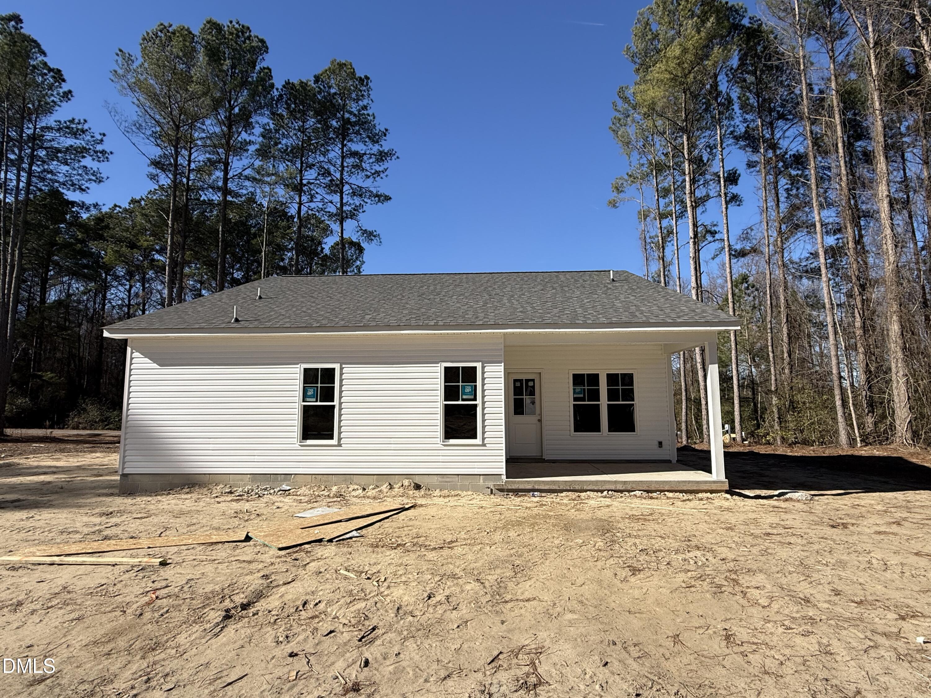 1725 Cardinal Drive Deep Run, NC 28525 - Photo 18 of 20 a front view of a house with a yard