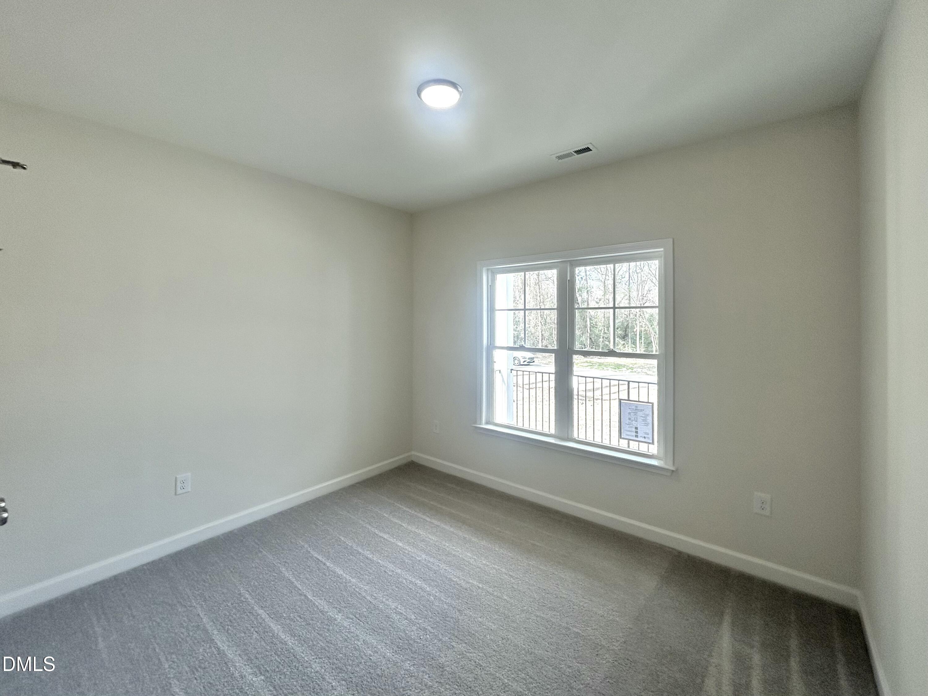 1725 Cardinal Drive Deep Run, NC 28525 - Photo 8 of 21 an empty room with a window