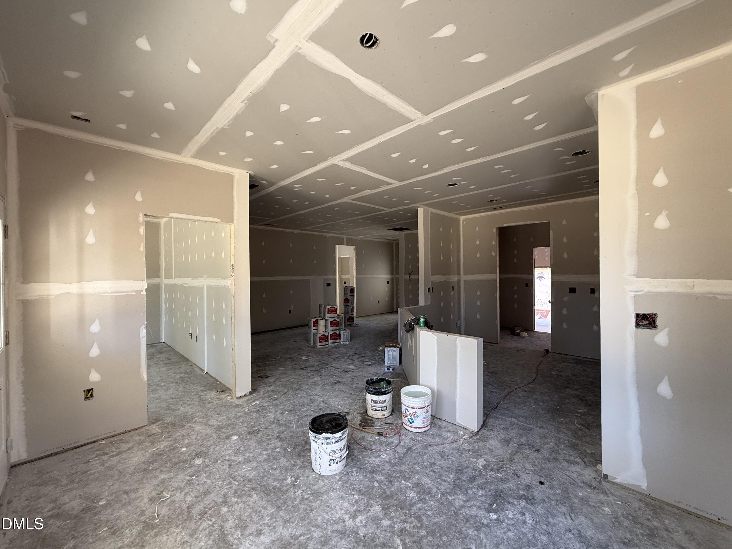 1725 Cardinal Drive Deep Run, NC 28525 - Photo 8 of 20 a view of a hallway with couch and chandelier
