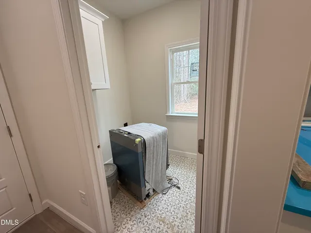 a utility room with a window