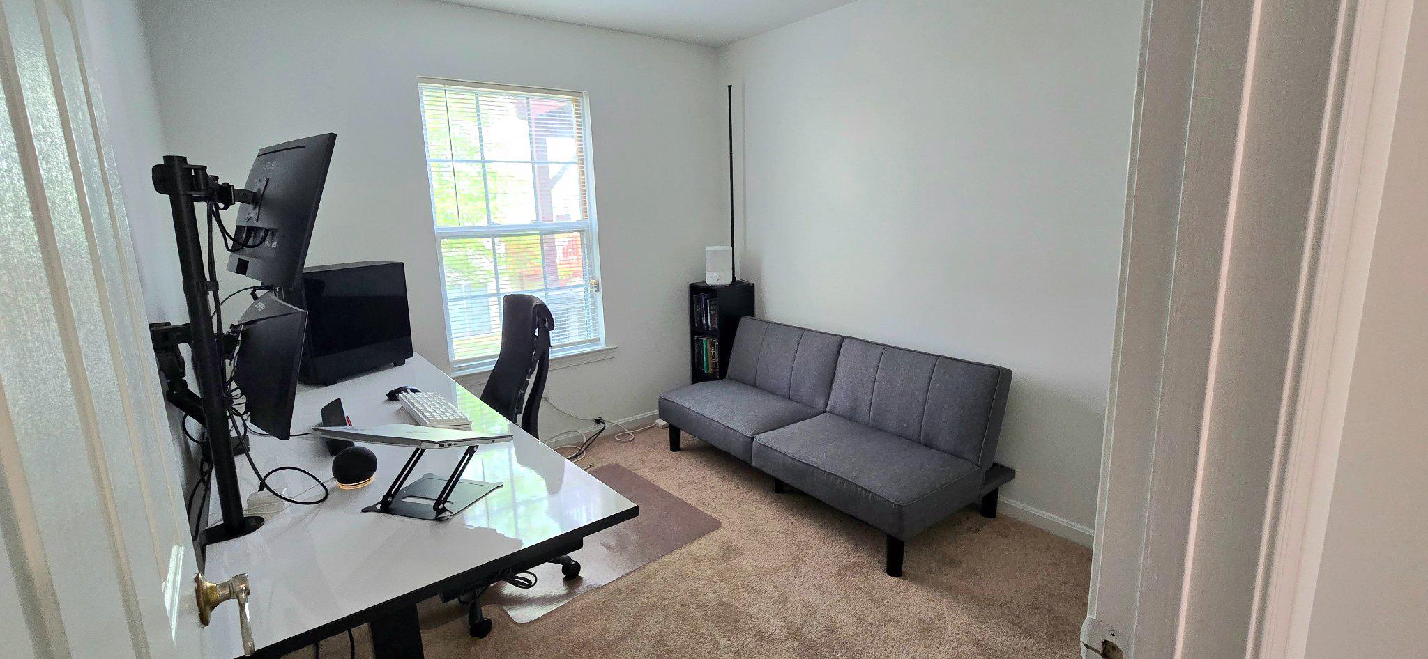 4218 Applegate Lane, Unit 9 Suitland, MD 20746 - Photo 20 of 35 a living room with furniture a flat screen tv and a window