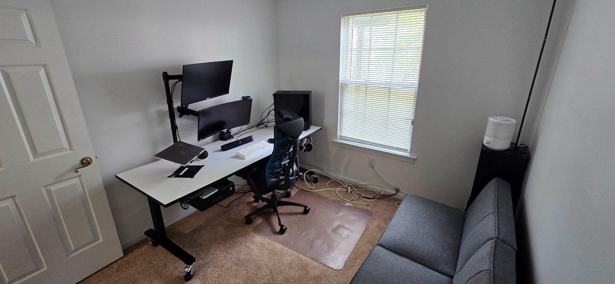 4218 Applegate Lane, Unit 9 Suitland, MD 20746 - Photo 21 of 35 a view of a workspace with furniture and a window