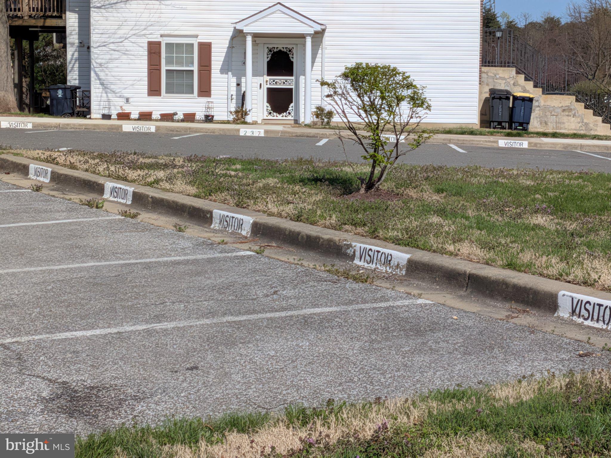 4218 Applegate Lane, Unit 9 Suitland, MD 20746 - Photo 25 of 35 a view of a house with a yard and plants