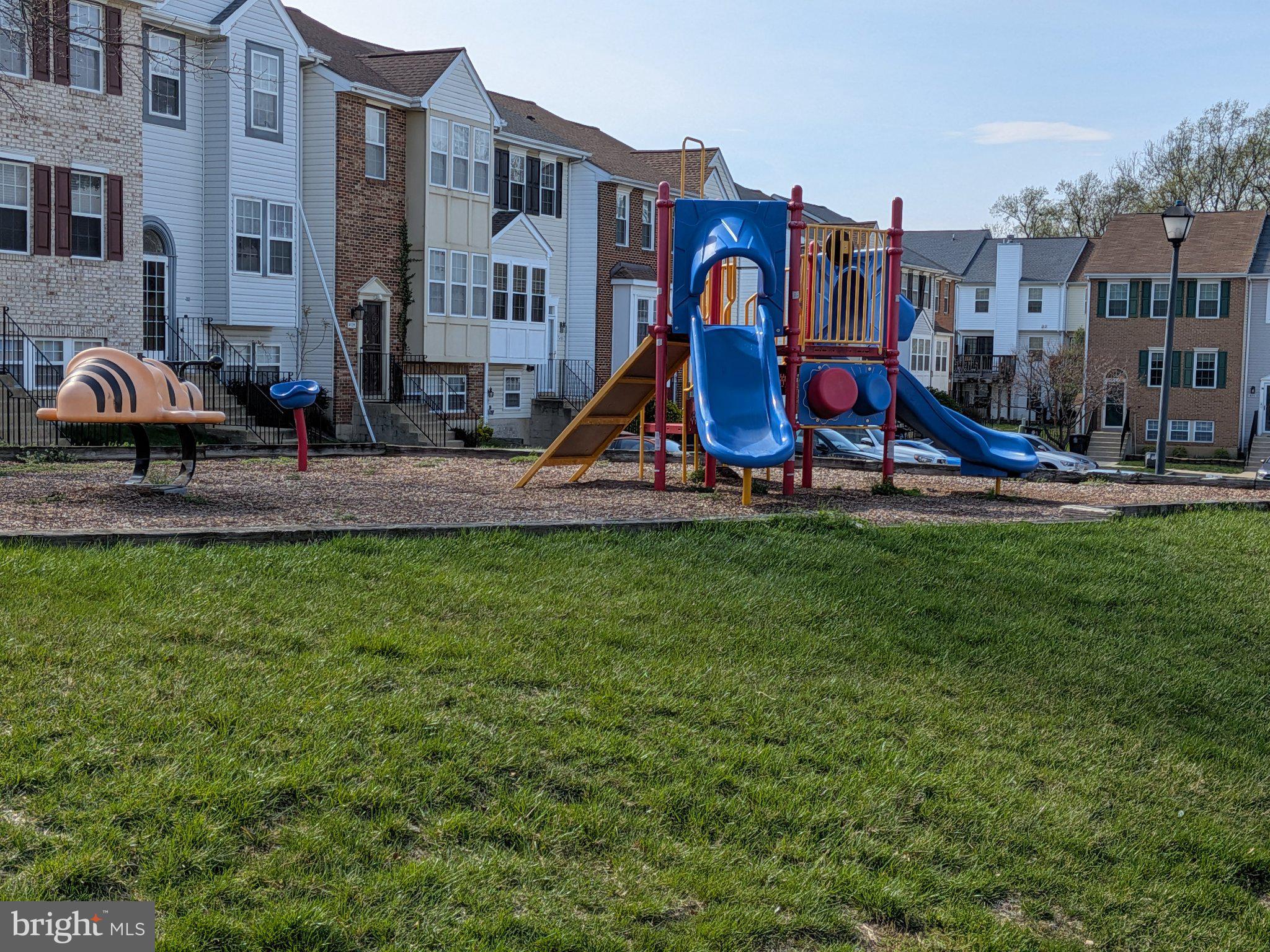 4218 Applegate Lane, Unit 9 Suitland, MD 20746 - Photo 30 of 35 a view of park with large trees and playing area