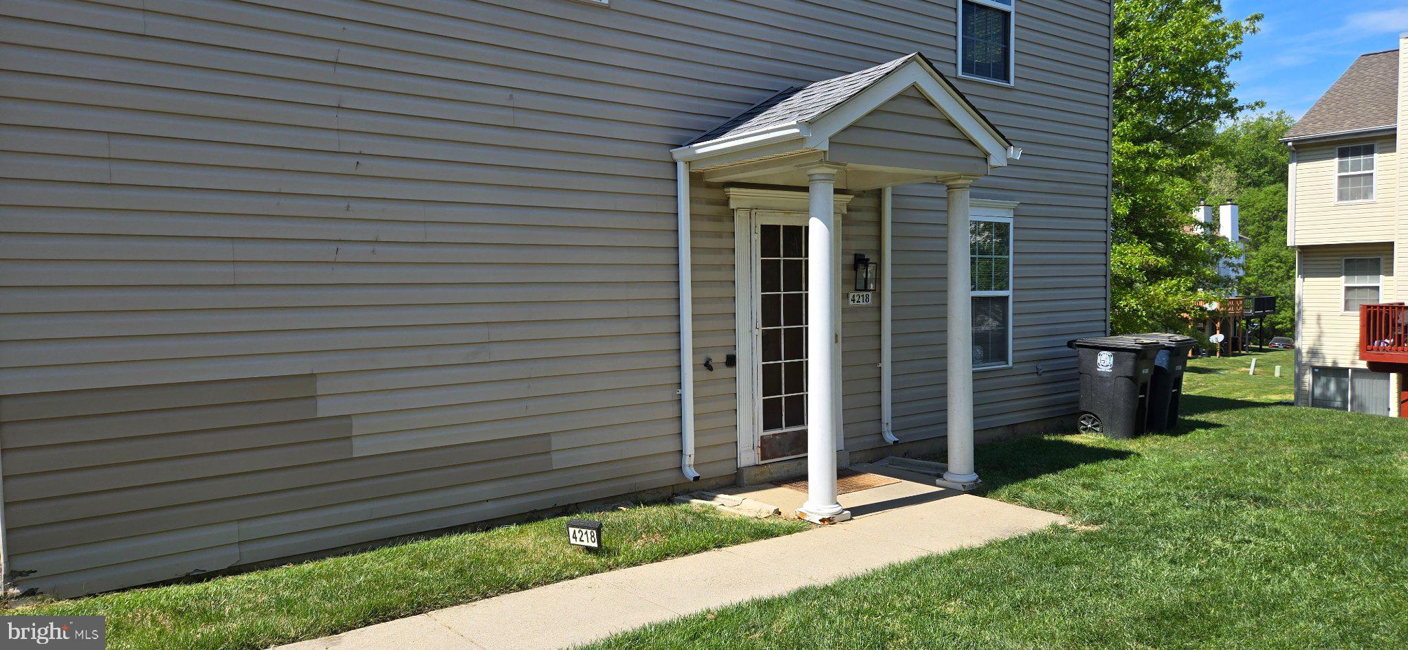 4218 Applegate Lane, Unit 9 Suitland, MD 20746 - Photo 35 of 35 a view of a house with a backyard