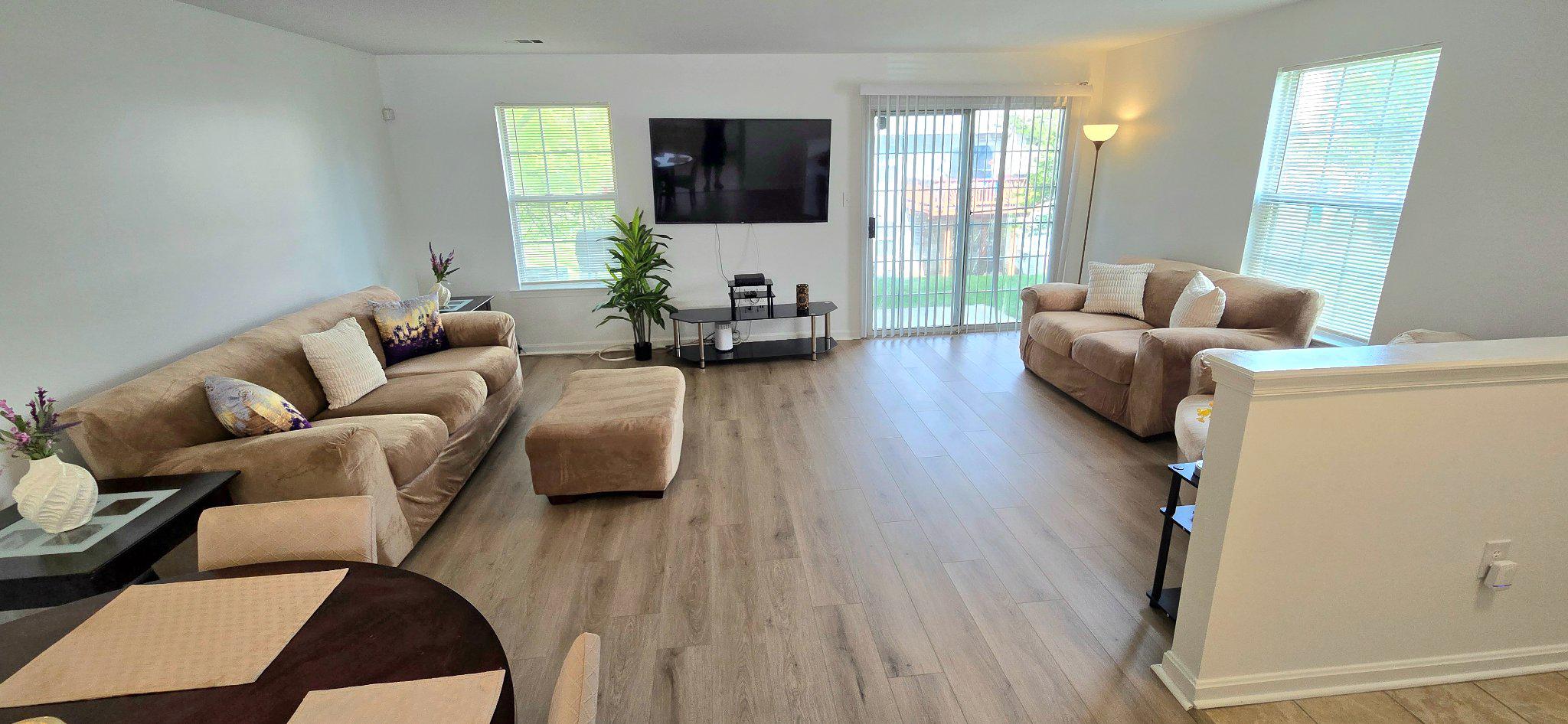 4218 Applegate Lane, Unit 9 Suitland, MD 20746 - Photo 4 of 35 a living room with furniture and a flat screen tv