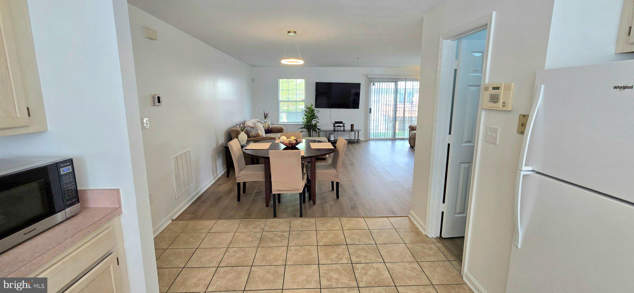 4218 Applegate Lane, Unit 9 Suitland, MD 20746 - Photo 5 of 35 a view of a dining room with furniture