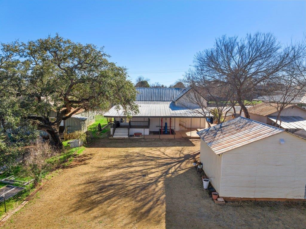 403 West Main Street Llano, TX 78643 - Photo 23 of 28 a view of a house with a yard