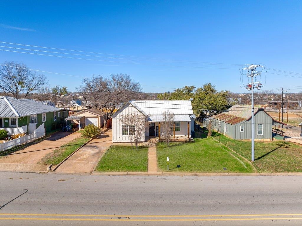 403 West Main Street Llano, TX 78643 - Photo 25 of 28 a view of a street with houses