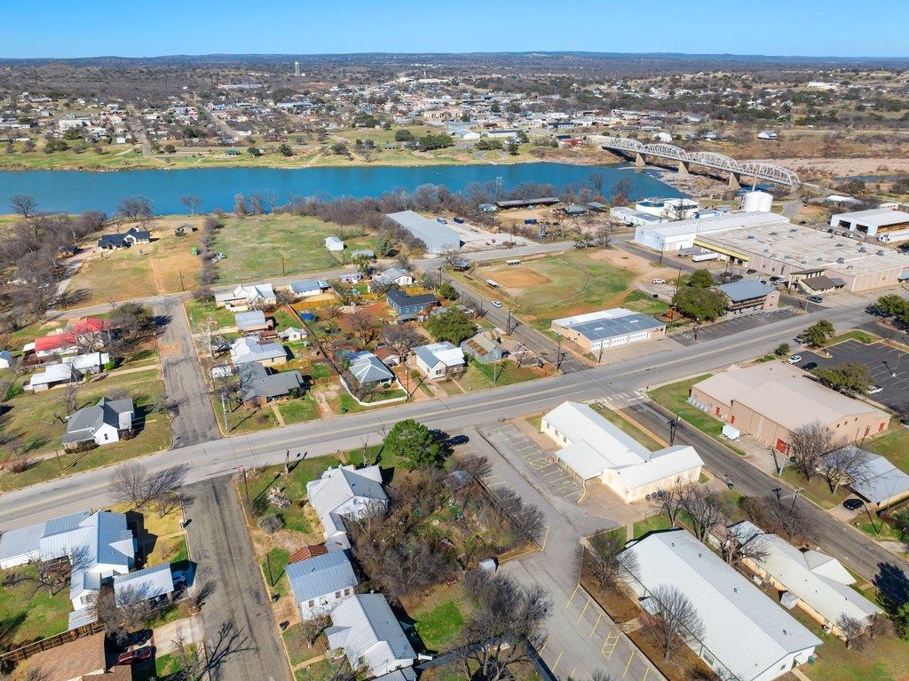 403 West Main Street Llano, TX 78643 - Photo 28 of 28 an aerial view of residential building and lake view