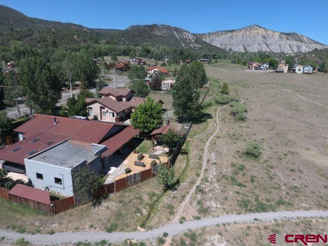 Tbd Tabernash Lane Ridgway, CO 81432 - Photo 11 of 21 an aerial view of a house with a mountain
