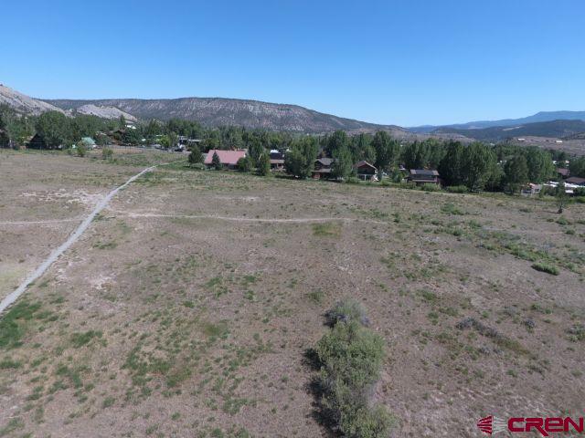 Tbd Tabernash Lane Ridgway, CO 81432 - Photo 10 of 21 a view of a road with mountains in the background