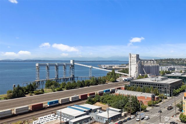 a view of a city with tall buildings in the background
