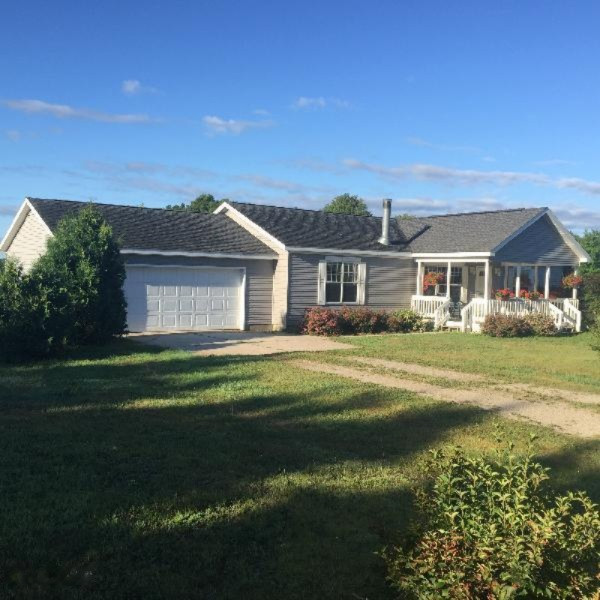 9055 Potter Road Bear Lake, MI 49614 - Photo 1 of 28 Wonderful appeal from the road