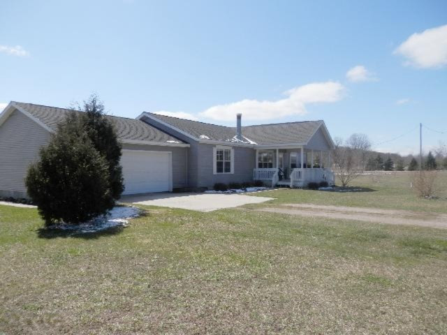 9055 Potter Road Bear Lake, MI 49614 - Photo 19 of 28 Huge side yard w/fruit trees