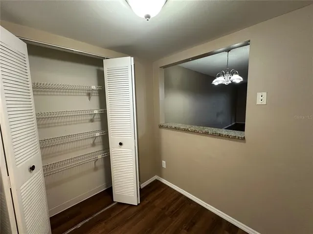 a view of a livingroom with wooden floor