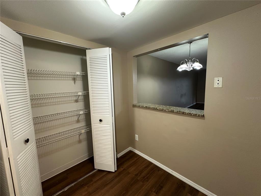 2440 Enterprise Road, Unit 2 Clearwater, FL 33763 - Photo 8 of 19 a view of a livingroom with wooden floor