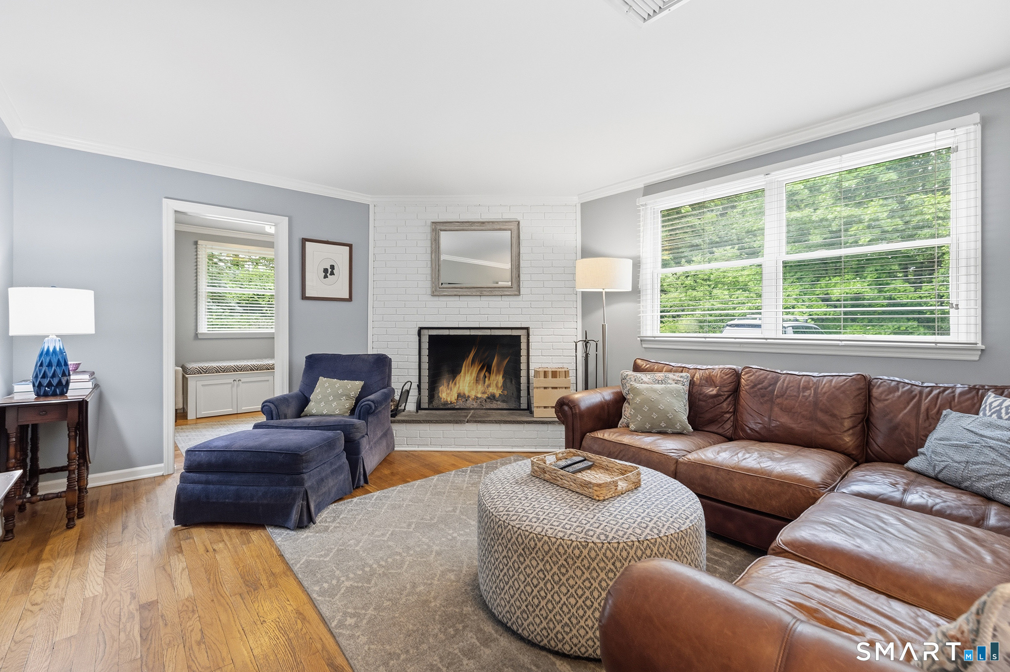 40 Ivy Hill Road Ridgefield, CT 06877 - Photo 5 of 38 The cozy family room with fireplace.