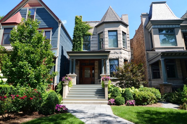 a front view of a house with a porch