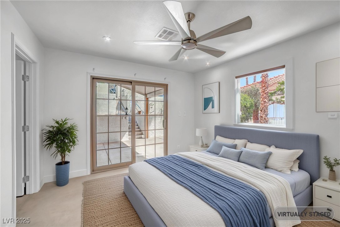 1318 Denver Street Boulder City, NV 89005 - Photo 14 of 32 Bedroom with access to outside, multiple windows, and a ceiling fan