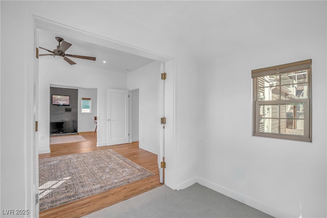 1318 Denver Street Boulder City, NV 89005 - Photo 20 of 32 Flexible room with French doors, hardwood floors, recessed lighting and many natural light capturing windows. Useful as a bedroom, office, dining room, entertainment room.
