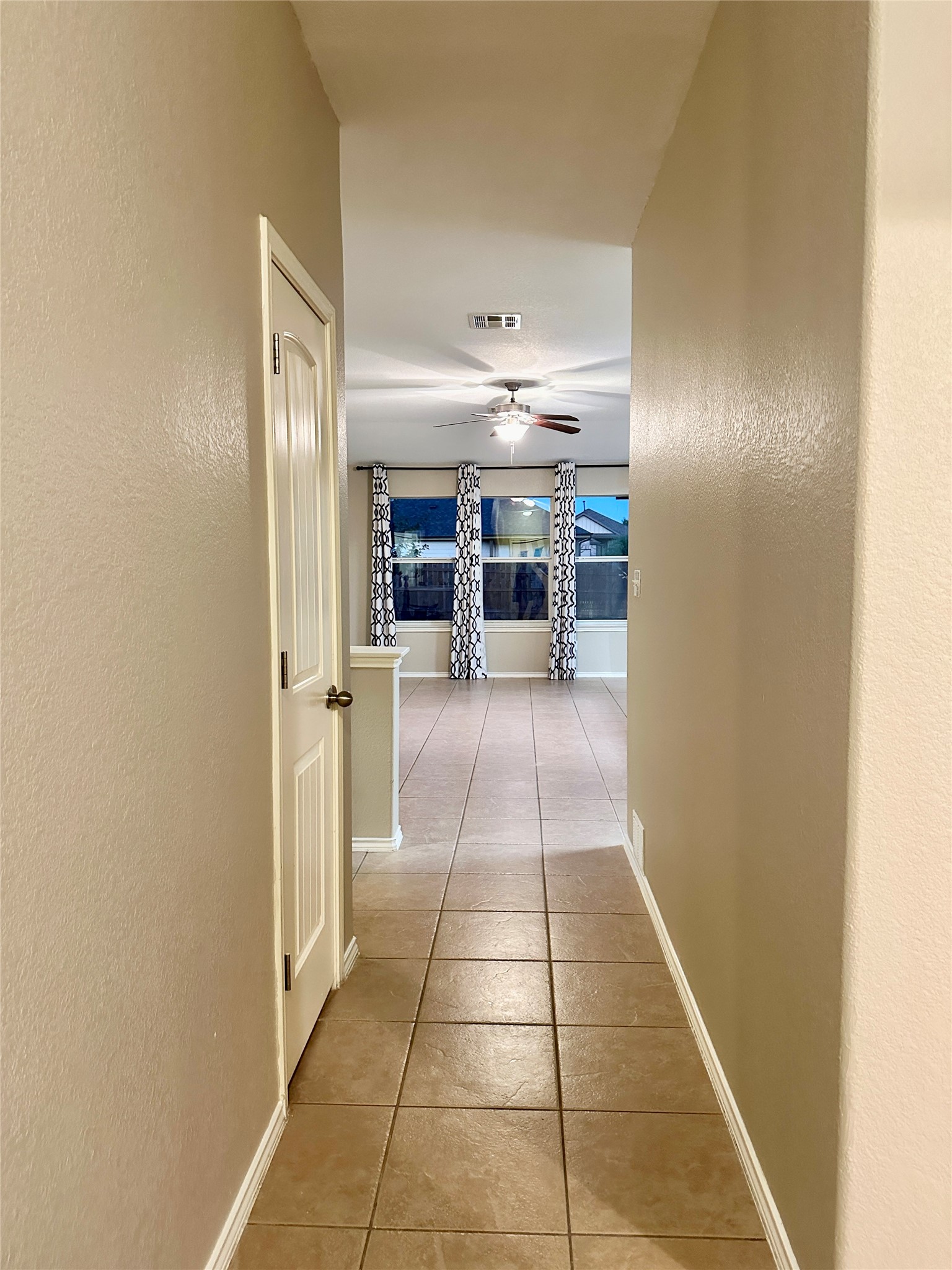 207 Dragon Ridge Road Buda, TX 78610 - Photo 2 of 38 View as you walk in, notice fresh paint through out the home.