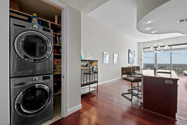 a room with wooden floors and furniture